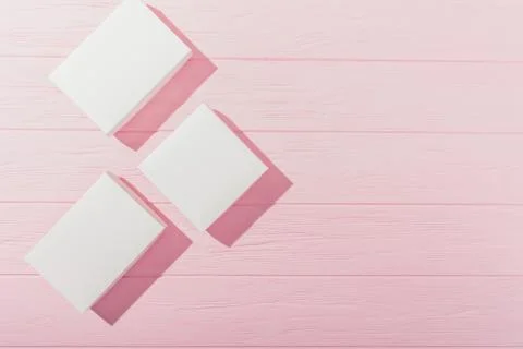 Flat lay side frame of rhombus blank presents 库存照片