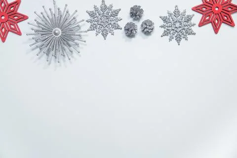 Flat lay of silver and red ornaments Stock Photos