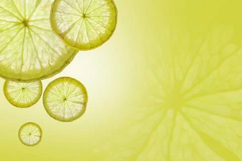 Flat lay Slice of lemon on green background , space for text Stock Photos