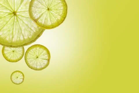 Flat lay Slice of lemon on green background , space for text Stock Photos