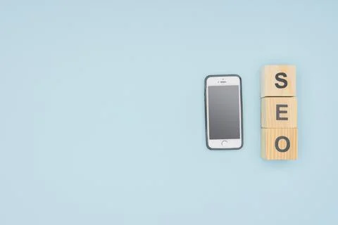 Flat lay smartphone cubes letters Stock Photos