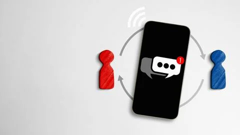 Flat lay of a smartphone showing a chat icon, connected by arrows to red an.. Stock Photos