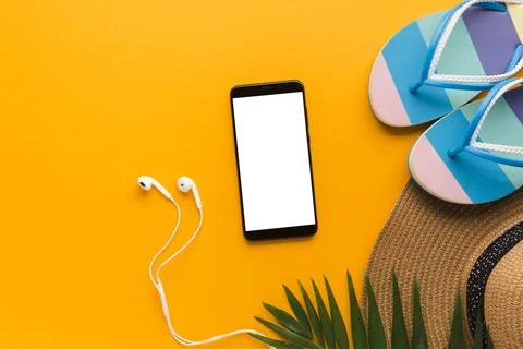 Flat lay smartphone with summer vacation concept Stock Photos