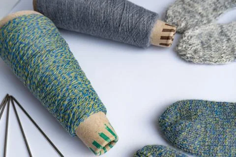 Flat lay of socks, thread and needles Stock Photos