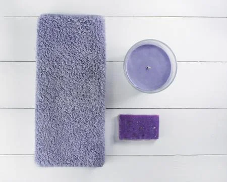 Flat lay spa bath on white wooden background, top view products for hygiene. Stock Photos
