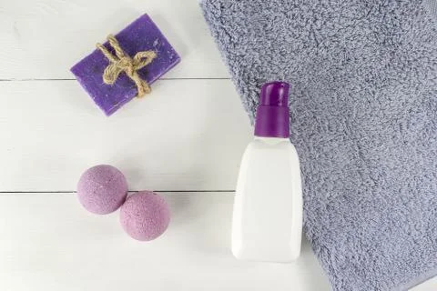 Flat lay spa bath on white wood background, top view cosmetic products for hy Stock Photos