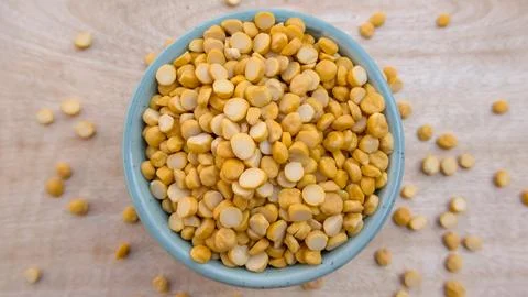 Flat Lay of Split Chickpeas (Chana Dal) Lentils in a Blue Bowl Stock Photos