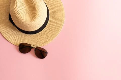 Flat lay with straw hat and sunglasses Stock Photos