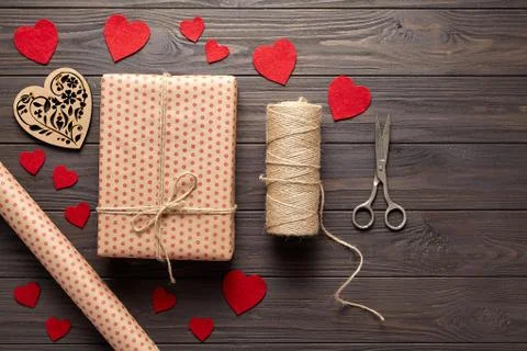 Flat lay Stylish composition with gift, scissors, wrapping paper and twine Stock Photos