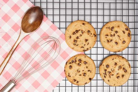 Flat lay of sweets, Chocolate chip cookie and confectionery equipment on rack Stock Photos