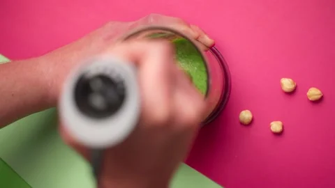 Flat lay tabletop video: chef makes pesto, 4k Stock Footage 205720902