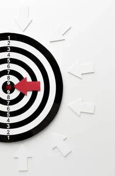 Flat lay target with arrows pointing bullseye Photos
