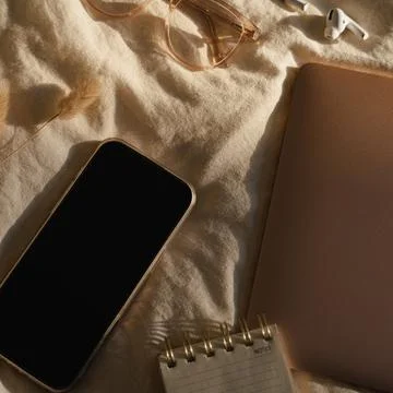 Flat Lay of Tech Gadgets and Stationery Stock Photos
