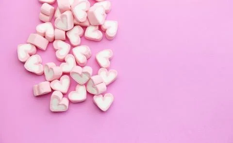 Flat lay template design top view pink marshmallows on sweet background Stock Photos