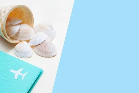 Flat lay on the theme of summer and beach holidays. Airplane and ice cream cone Stock Photos