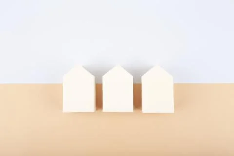 Flat lay with three white make up sponges on pastel beige and white background Stock Illustration