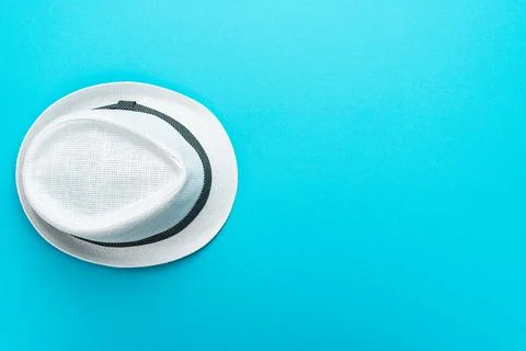 Flat lay top-down composition of white trilby hat Stock Photos