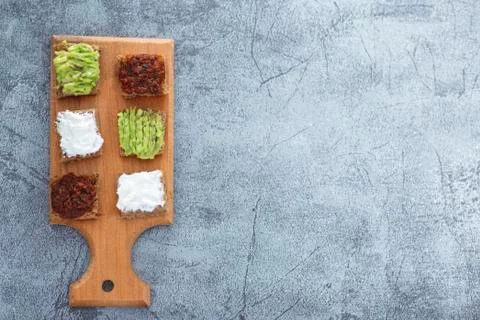Flat lay top view of bread bites with several tapas copy space include Foto stock