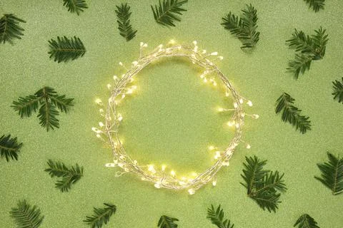 Flat lay top view, Christmas background circle shape border frame, light garl Stock Photos