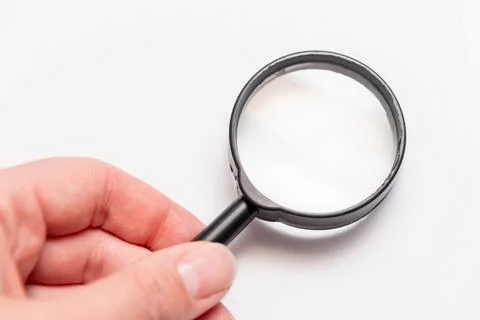 Flat lay top view copy space notebook, mouse and magnifying glass white offic 스톡 사진