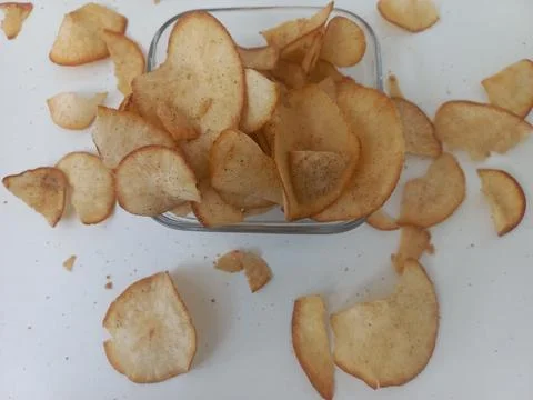 Flat Lay Top View of Crispy Cassava Chips on White Surface Stock Photos