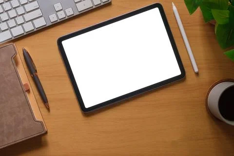 Flat lay, top view of digital tablet with blank display, laptop, notebook a.. Stock Photos
