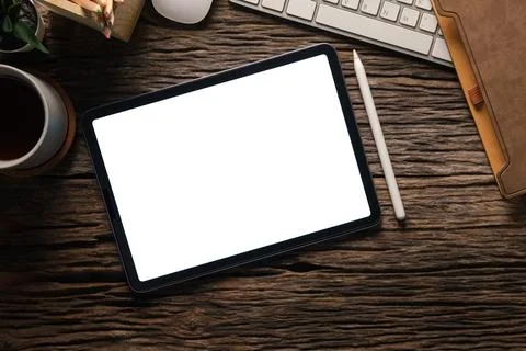 Flat lay, top view of digital tablet with blank display, laptop, notebook a.. Stock Photos
