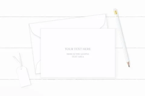 Flat lay top view elegant white composition paper envelope pencil tag on wood 스톡 일러스트
