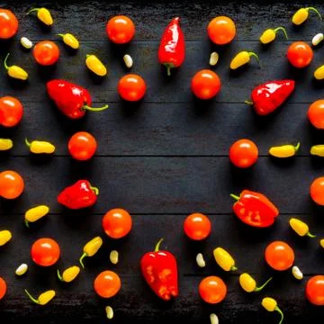 Flat Lay Top View Geometric pattern with Tomato and Chili Pepper Stock Photos