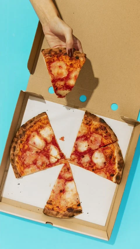 Flat lay Top view Hands Taking Pizza Cuts from Box on Blue Table Stock Footage 155779762