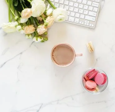 Flat lay, top view home office table feminine desk. workspace with laptop, cup o Stock Photos