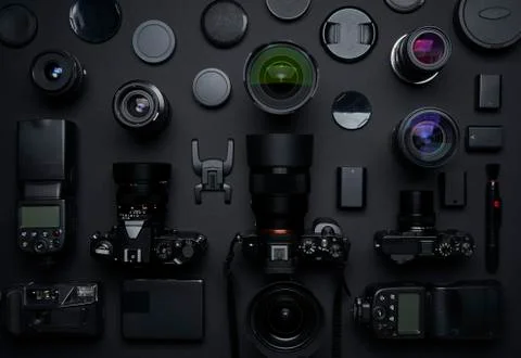 Flat lay top view of many various unknown brand camera,lens and photography e Stock Photos