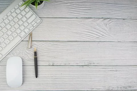 Flat lay, top view office table desk. Workspace with pen, mouse, decoration  Stock Photos