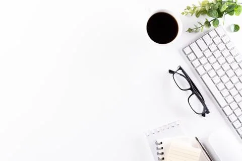 Flat lay, top view office table desk. Workspace with keyboard, office supplie Stock Photos