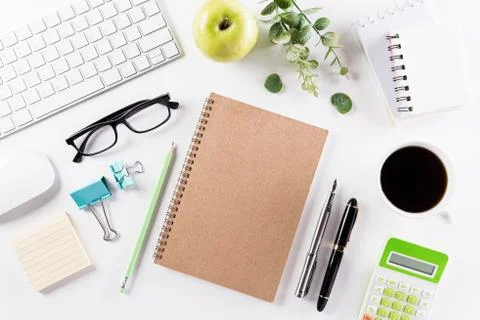 Flat lay, top view office table desk. Workspace with keyboard, office supplie Stock Photos