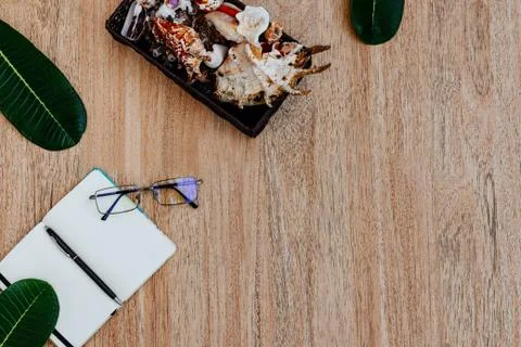 Flat lay, top view of an open white notebook with pen for writing cases Stock Photos