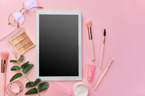 Flat lay, top view pink modern office table desk. Stock Photos