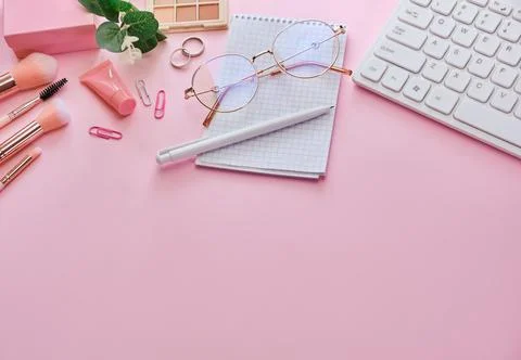 Flat lay, top view pink modern office table desk. Stock Photos