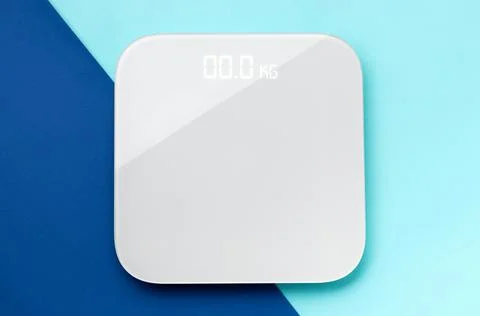Flat lay top view scales onblue double background with copy space 스톡 사진