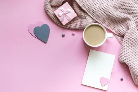 Flat lay top view valentine's day card. Pink pastel background with a coffee Stock Photos