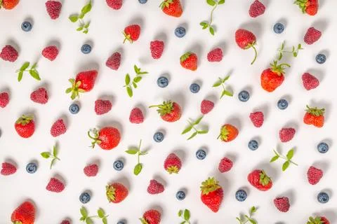Flat lay of trendy seamless pattern strawberry, raspberries, blueberry berr.. Stock Photos