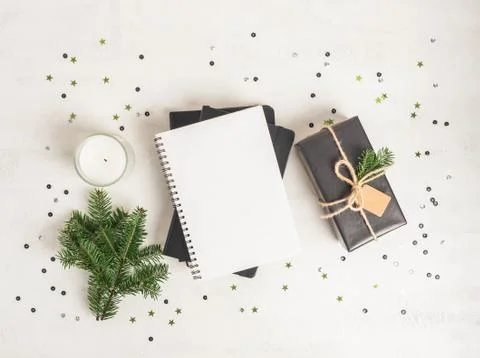 Flat lay of various Christmas decor and notebook with blank page Stock Photos