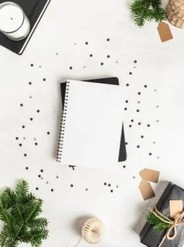 Flat lay of various Christmas decor and notebook with blank page Stock Photos