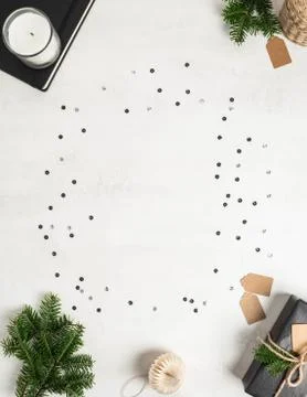 Flat lay of various Christmas decor and confetti frame Stock Photos