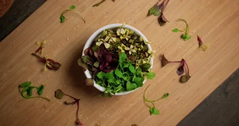 Flat lay various microgreens in a bowl on cutting board healthy eating cocncept. Stock-Footage 152528964