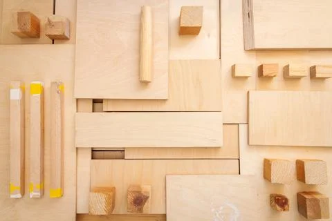 Flat lay of various wood and plywood pieces Stock Photos