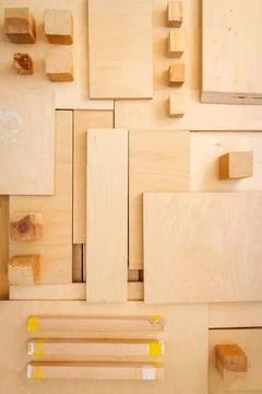 Flat lay of various wood and plywood pieces Stock Photos