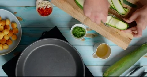 Flat lay: vhef slices zucchini Stock Footage 217440152
