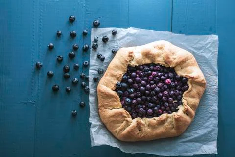 Flat lay view of low calorie diet blueberry open pie Photos