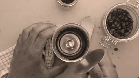 Flat lay view person preparing espresso coffee with a moka pot-25s Stock Footage 130757185